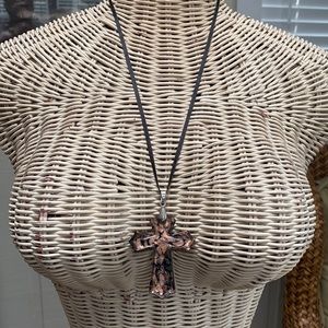 Big glass cross on a ribbon necklace
